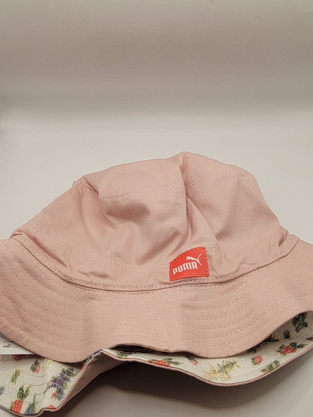 Puma Pink Reversible Floral-Trim Bucket Hat